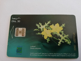 UNITED ARAB EMIRATES -ETISALAT- UAE 211   DHS 30 / FLOWERS/   CHIPCARD Phonecard As Scan  FINE USED    ** 9040** - Emirats Arabes Unis