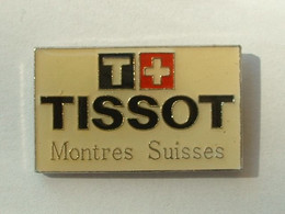 Pin's TISSOT - MONTRES SUISSE - Démons & Merveilles - Trademarks