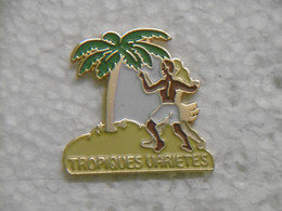 Pin's Musique TROPIQUES VARIETES - Pins EGF Pin Badge Danseur Sous Un Palmier - Musique