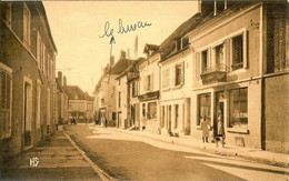 89 VERMENTON LA GRANDE RUE LE 9 JUILLET 1945 PHOTO SUFFIZE EDITEUR A VERMENTON - Vermenton