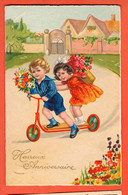 ZML-34  Couple D'enfants à Trotinette Avec Bouquet De Fleurs Circulé 1932 - Geburtstag