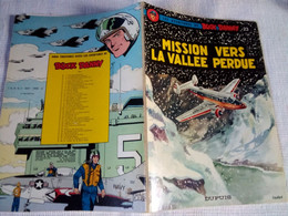 LES AVENTURES DE BUCK DANNY  N°23 " Mission Vers La Vallée Perdue "   1974  DUPUIS   BD SOUPLE  TBE - Buck Danny