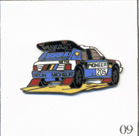 Pin's Sport Auto / Rallye Avec Peugeot 205 - Sponsors Michelin Et Pioneer. Est. Démons Et Merveilles. EGF. T791-09 - Peugeot