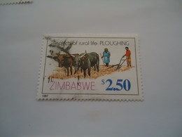 ZIMBABWE  USED  STAMPS COW  WORKER - Zimbabwe (1980-...)