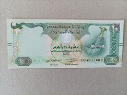 Billete De Emiratos Arabes Unidos United Arab 10 Dirhams, Nº Bajo 001027487, UNCIRCULATED - Ver. Arab. Emirate