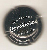 CAPSULE DE MUSELET CHAMPAGNE CANARD DUCHENE (blanc Et Or SuR NOIR CONTOUR NOIR) MENTION FRANCE - Canard Duchêne