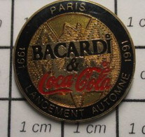 3317 Pin's Pins / Beau Et Rare / THEME : BOISSONS / RHUM BACARDI & COCA-COLA LANCEMENT PARIS AUTOMNE 1991 - Bebidas
