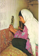 GIRL WEAVING CARPET. - Iran
