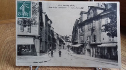 CPA   BELLEY  Rue De La Louvatière.  (19..) .animée , Magasins.(S21-22) - Belley