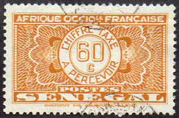 Sénégal Obl. N° Taxe 28 - Pièce De Monnaie Sur Fond Burelé Le 60c Orange - Timbres-taxe