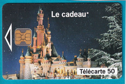 Télécarte 50 Unités " Le Cadeau * Euro Disney     " - Usagée -   Nov 93 - Tirage 6 Millions Ex - Disney