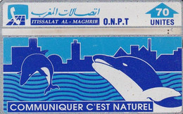 MOROCCO(L&G) - Dolphins, Communicating Is Natural, O.N.P.T. Telecard 70 Units, CN : 702C, Used - Delfini