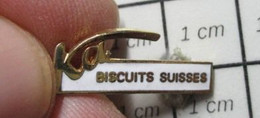 1316b Pin's Pins / Beau Et Rare / THEME : ALIMENTATION / BISCUITS SUISSES KA Pin's Double Attache - Alimentation