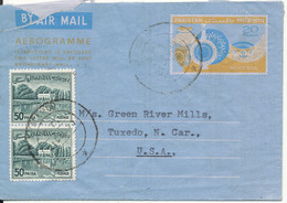 Pakistan Aerogramme Uprated And Sent To USA 21-12-1973 Also With Stamps On The Backside - Pakistan