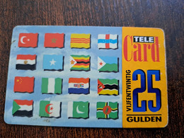 NETHERLANDS  PREPAID 25 HFL  FLAGS DIFFERENTS  TELE-CARD  USED CARD   ** 10284** - Non Classificati