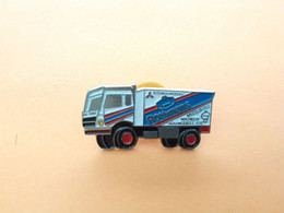 Pin S Pin's AUTOMOBILE AUTO CAMION POIDS LOURD MITSUBISHI MICHELIN FACOM DAKAR Metal (bazarcollect28) - Mitsubishi