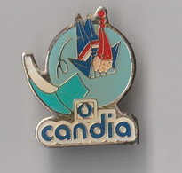 PIN'S   THEME JEUX OLYMPIQUES ALBERTVILLE 1992 LA MASCOTTE SAUT  A SKI PUB CANDIA - Jeux Olympiques