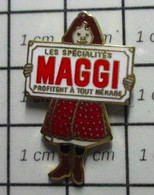 1416a Pin's Pins / Beau Et Rare / THEME : ALIMENTATION / FILLETTE LES SPECIALITES MAGGI PROFITENT A TOUT MENAGE - Alimentation