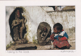 Child And Sculptures "Taking To The Gods" - Nepal