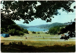 CPM DE LA SALVETAT-SUR-AGOUT  (HERAULT) CENTRE DE VACANCES DE LA SOCIETE DES CIMENTS FRANÇAIS. LAC DE LA RAVIEGE. PLAGE - La Salvetat