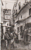 Cpsm 9x14 . ALGERIE. ALGER. Une Rue De La Casbah (animée Dont étal De Boucher ) - Algerien