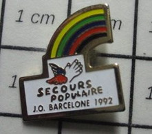 911C Pin's Pins / Beau Et Rare / THEME : JEUX OLYMPIQUES / SECOURS POPULAIRE 1992 BARCELONA  ARC EN CIEL - Jeux Olympiques