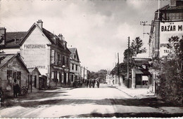 CPA - 10 - MAILLY LE CAMP - La Grande Rue - Animée - Voiture Café De La Presse Photo Collin - Tannay - Mailly-le-Camp