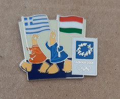 Athens 2004 Olympic Games - Mascots With E.U. Flags, Greece - Hungary Flags Pin - Jeux Olympiques