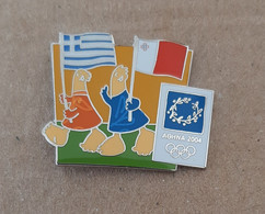 Athens 2004 Olympic Games - Mascots With E.U. Flags, Greece - Malta Flags Pin - Jeux Olympiques