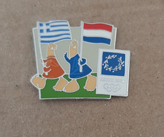 Athens 2004 Olympic Games - Mascots With E.U. Flags, Greece - Netherlands Flags Pin - Jeux Olympiques