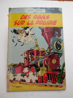 BD Lucky Luke Des Rails Sur La Prairie Une BD De René Goscinny Et Morris  Chez Dupuis .CO..PIN070. - Lucky Luke