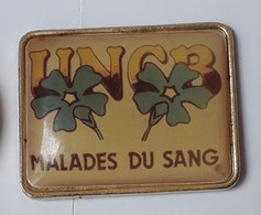 B83 Pin's Maladies Du Sang Médecine UNCB Fleur Violette Achat Immédiat - Médical