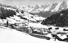 74 - GRAND BORNAND : Vue Générale Et La Chaîne Des Aravais - CPSM Dentelée N/B Village Format CPA 1958 - Haute Savoie - Other & Unclassified