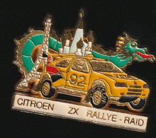 75133-Pin's. Citroen.ZX.rallye.Raid.Dragon.signé CEF Paris. - Citroën