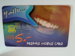 SURINAME US $ 5,-    PREPAID CALLING CARD   /  HALLO/MOUTH/TEETH           **10924** - Suriname