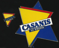 75296-série De 2 Pin's.Pastis Casanis.trés Grand.2 Tacks.signé ATC - Getränke
