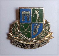 L145 Pin's Le Comptoir Du Golf écusson Blason Qualité EGF Laurier Achat Immédiat - Golf