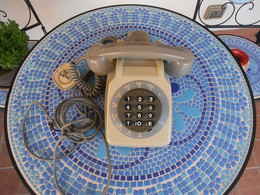 TELEFONO FRANCESE CON AURICOLARE - Material
