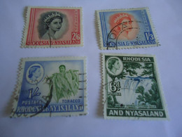 RHODESIA  NYASALAND  USED STAMPS 4 LOT - Rhodesia & Nyasaland (1954-1963)