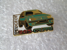 PIN'S     PEUGEOT  205  GTI  GRIFFE  Zamak   HELIUM - Peugeot