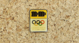 Pin's JO BARCELONE 92 - Logo - M&M'S - Verni époxy - Fabricant COOB - Jeux Olympiques