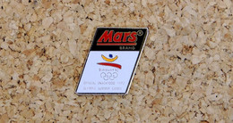 Pin's JO BARCELONE 92 - Logo - MARS - Peint Cloisonné - Fabricant COOB - Jeux Olympiques