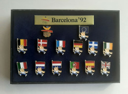 Barcelona 1992 Olympic Games -14 Flags Pins With Mascot Cobi, In Case - Jeux Olympiques