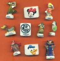 Lot De 10 Feves Porcelaine 3D Diverses Disney Et Dessins Animés - Disney