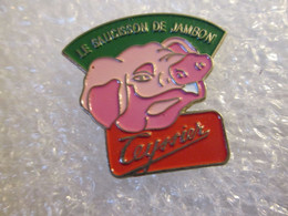 PIN'S    ANIMAUX  COCHON   LE SAUCISSON DE JAMBON TESSIER - Animaux