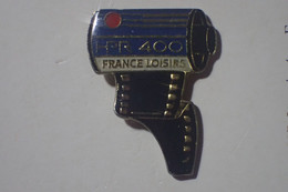 Pin's D'une Péliicule Photo HPR 400 De Chez France Loisirs - Photographie