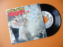 DISQUE VINYL 45 T 17 Cm CAPTAIN SENSIBLE'S WOT / STRAWBERRY DROSS 1982 - Sonstige - Niederländische Musik