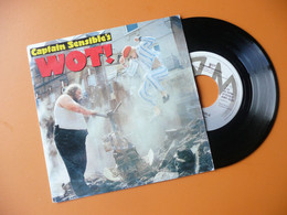 DISQUE VINYL 45 T 17 Cm CAPTAIN SENSIBLE'S WOT / STRAWBERRY DROSS 1982 - Andere - Nederlandstalig