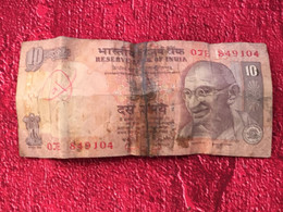 Billet Banque Reserve Bank Of India-☛Inde:Recto	Mohendas Karamchand "Mahatma" Gandhi Verso:Tigre, Rhinocéros, Eléphant - India