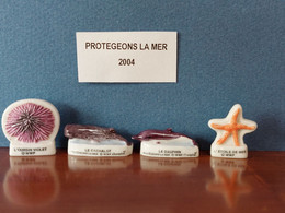 PROTEGEONS LA MER - LOT DE 4 FEVES - L'oursin Violet, Le Cachalot, Le Dauphin, L'étoile De Mer - 2004 - Animales